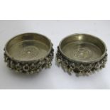 A pair of Middle Eastern white metal candle stands Please Note - we do not make reference to the