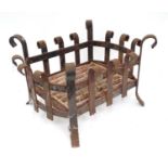 A cast iron fire basket with scroll decoration Please Note - we do not make reference to the