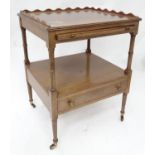 A small mahogany etagere Please Note - we do not make reference to the condition of lots within