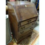 A 18thC small oak bureau Please Note - we do not make reference to the condition of lots within