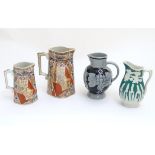 Four assorted jugs, two of quatrefoil form with transfer decoration of panelled flower and sepia