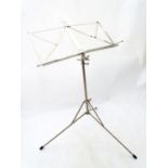 Music stand. Approx. 42" extended Please Note - we do not make reference to the condition of lots