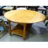 A modern pine coffee table with drop leaves Please Note - we do not make reference to the
