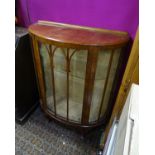 A glazed demi lune walnut display cabinet Please Note - we do not make reference to the condition of