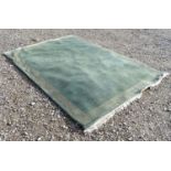 A large hall rug with a grey and blue ground with a white border. Approx. 68" wide Please Note -