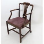 A 19thC mahogany carver chair with upholstered seat Please Note - we do not make reference to the