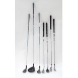 Seven assorted golf clubs Please Note - we do not make reference to the condition of lots within
