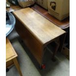 A 19thC drop flap dining table with cabriole feet and pad feet. Please Note - we do not make