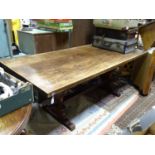 A large oak dining / refectory table Please Note - we do not make reference to the condition of lots