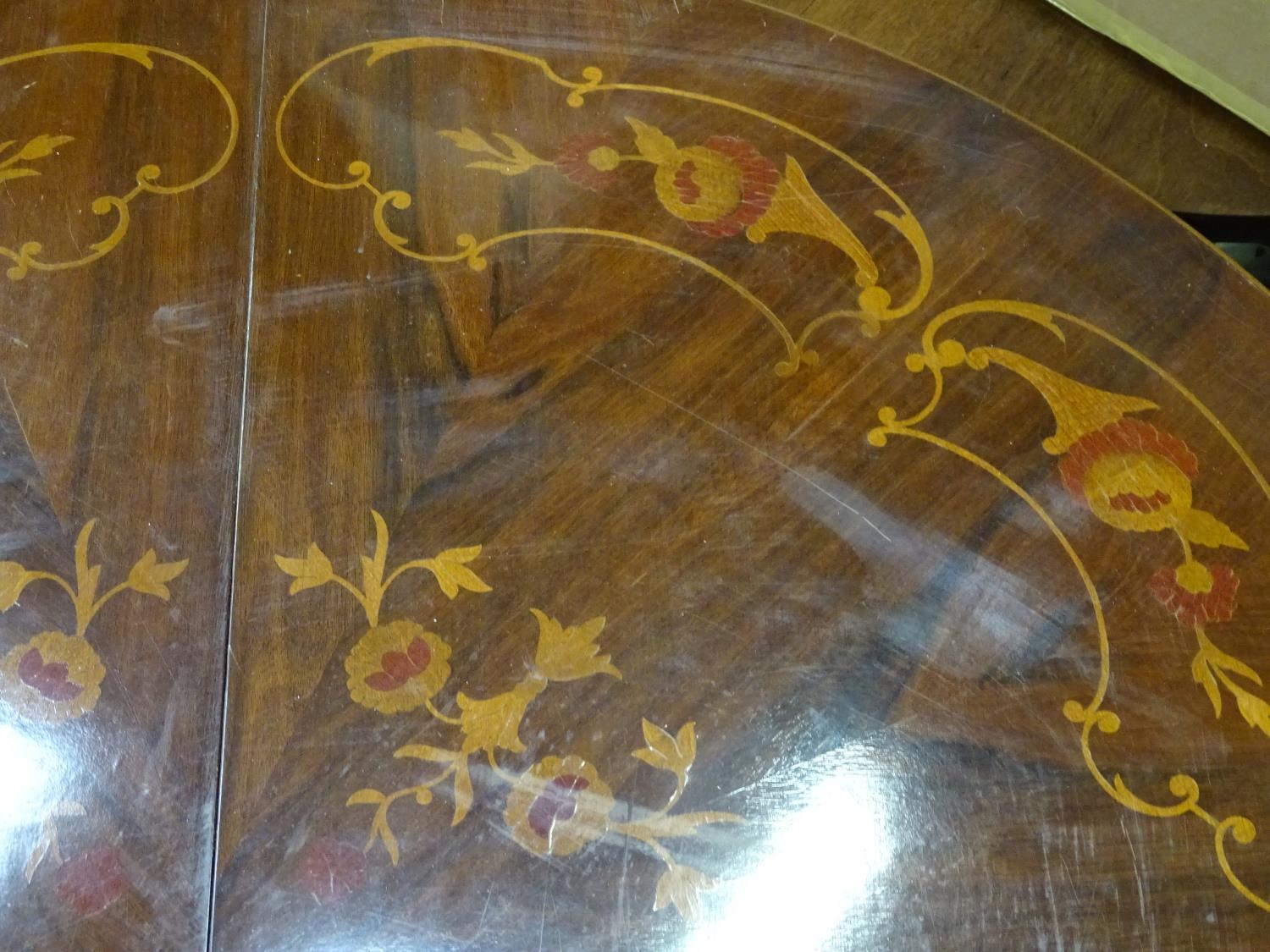 A circular mahogany inlaid dining table Please Note - we do not make reference to the condition of - Image 4 of 4