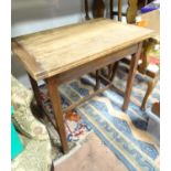 An oak fold-over table Please Note - we do not make reference to the condition of lots within