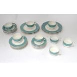 A quantity of Wedgwood dinner wares in the pattern Garden Aqua, to include tea cups and saucer,