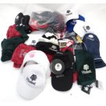A quantity of golfing equipment and clothing to include caps, club covers, etc. Please Note - we