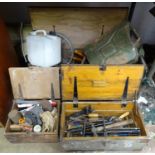 A large quantity of tools within wooden chests Please Note - we do not make reference to the