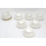 A quantity of Royal Worcester tea wares in the pattern Gold Chantilly, comprising cups, saucer, milk