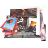 Two film posters, The Devil's Advocate, and Pocahontas, together with a Queen poster and an Elvis