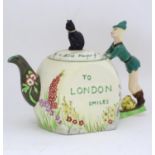 A novelty Dick Whittington teapot Please Note - we do not make reference to the condition of lots