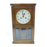 A 20thC English wall clock Please Note - we do not make reference to the condition of lots within