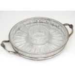 A silver plated entree dish with 5 inset glass sections Please Note - we do not make reference to