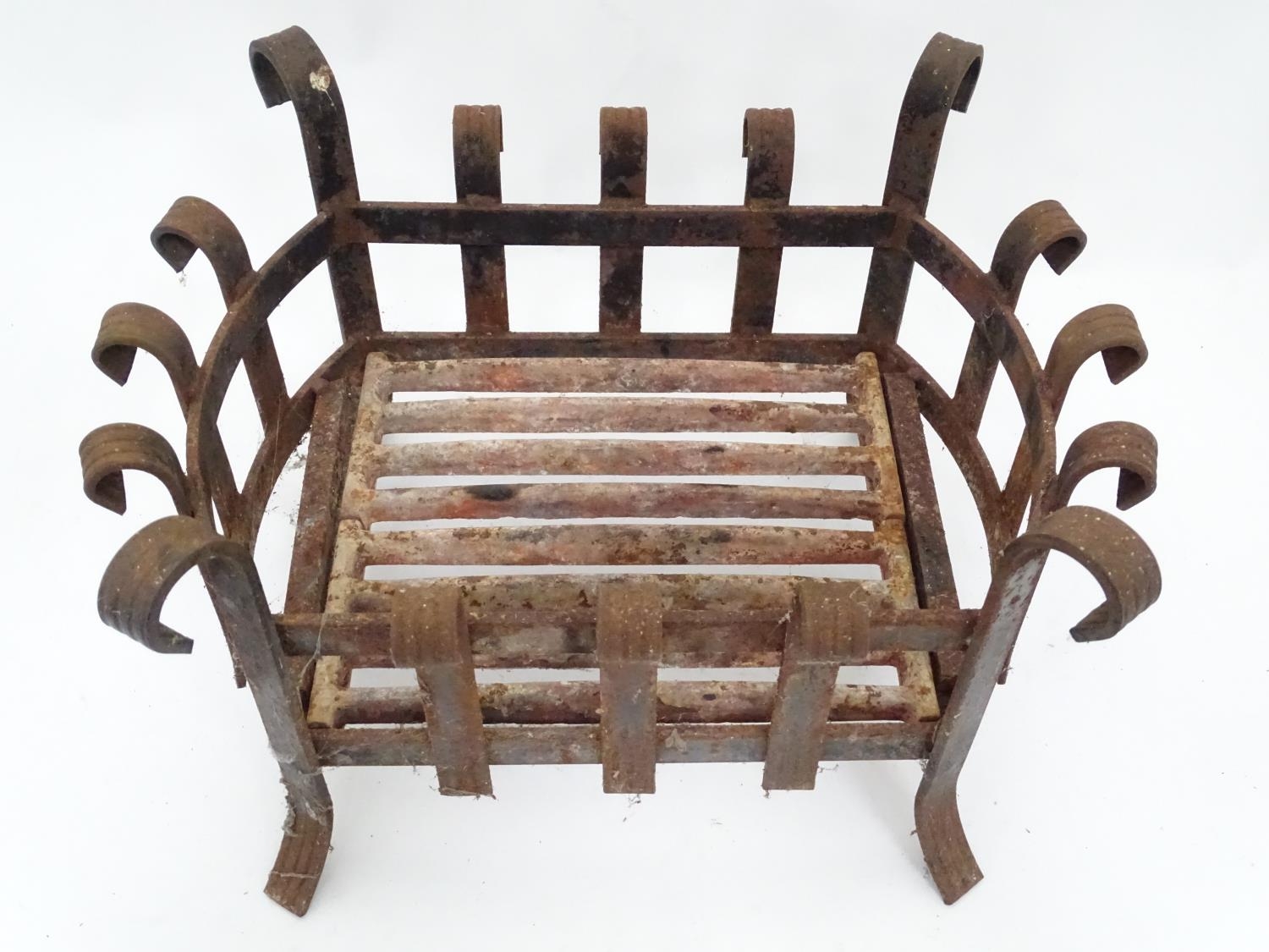 A cast iron fire basket with scroll decoration Please Note - we do not make reference to the - Image 4 of 6