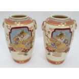 A pair of Japanese vases with samurai decoration Please Note - we do not make reference to the
