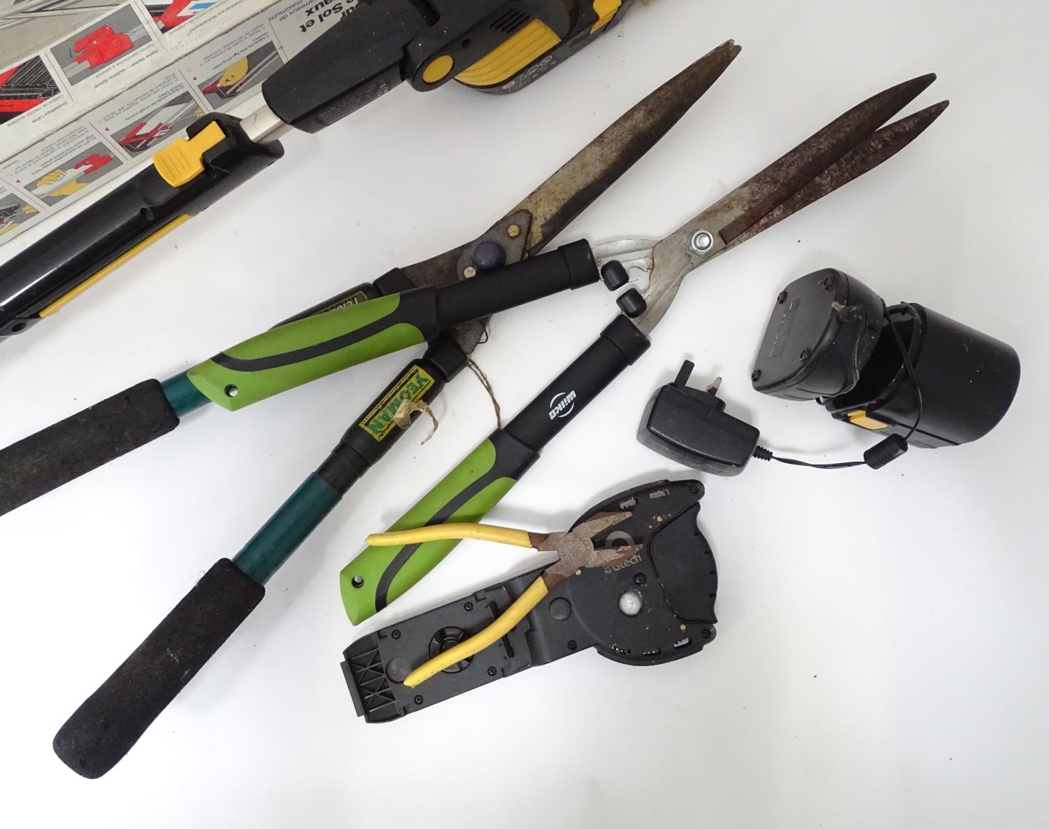 A quantity of assorted tools to include tile cutter, Gtech hedge trimmer, etc Please Note - we do - Image 3 of 5