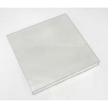 A square mirror with bevelled edges. Approx. 12" x 12" Please Note - we do not make reference to the