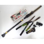 A quantity of assorted tools to include tile cutter, Gtech hedge trimmer, etc Please Note - we do