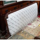 A carved mahogany headboard with upholstered central section Please Note - we do not make