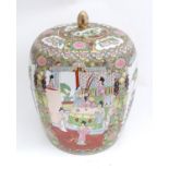 A large Oriental pot and cover Please Note - we do not make reference to the condition of lots