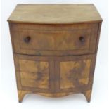 An early 19thC bow fronted commode Please Note - we do not make reference to the condition of lots