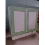 An early 20thC painted 2 door cupboard. Approx. 30" wide Please Note - we do not make reference to