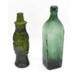 A green glass whiskey bottle, together with a decorative bottle (2) Please Note - we do not make