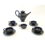 A quantity of Kahler Keramik Danish studio pottery tea wares, comprising a teapot and four cups