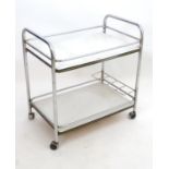 A 20thC medical trolley chromed with Formica tiers Please Note - we do not make reference to the