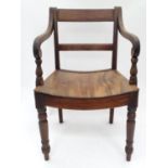 A Regency mahogany carver chair Please Note - we do not make reference to the condition of lots
