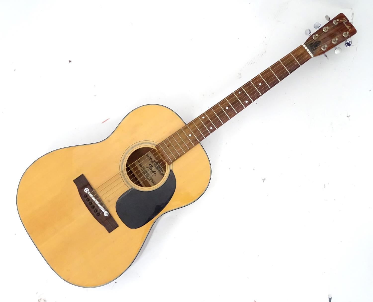 A 1975 Fender model F15 acoustic guitar Please Note - we do not make reference to the condition of