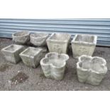 Four pairs of reconstituted stone planters Please Note - we do not make reference to the condition