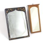 Two 20thC mirrors, one with a walnut rectangular frame and the other having an ebonised frame with