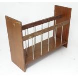 A mid 20thC vintage retro magazine rack Please Note - we do not make reference to the condition of