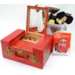 A box of miscellaneous items to include a large vanity case, scales, Mickey Mouse clock, etc. Please