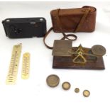 Assorted items to include postage scales with weights, two 20thC British thermometers and a Kodak