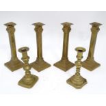 Four matching brass candlesticks, together with a pair of brass candlesticks (4+2) Please Note -