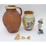 A 19thC terracotta jug together with a 20thC vase Please Note - we do not make reference to the