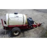 A water bowser with pressure hose fixed to a trailer Please Note - we do not make reference to the
