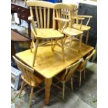 A pine dining table with 6 chairs Please Note - we do not make reference to the condition of lots
