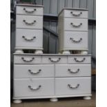 A double chest of drawers together with two bedside cabinets Please Note - we do not make