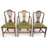 Three Georgian elm dining chairs (3) Please Note - we do not make reference to the condition of lots