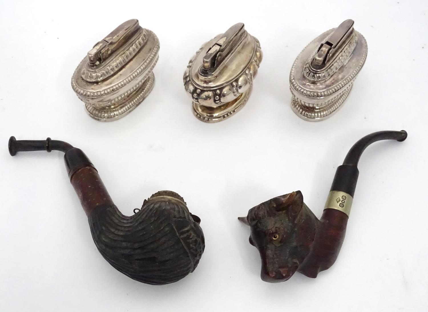 A Briar smoking pipe, the bowl formed as a buffalo stamped RAOB (Royal Antediluvian Order of