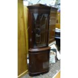 A late 20thC mahogany corner cabinet with glazed top Please Note - we do not make reference to the